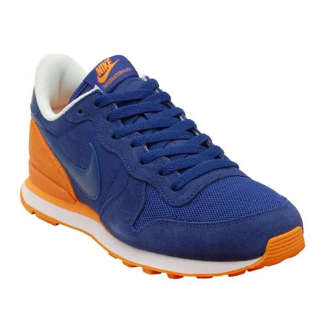 orange and blue gym shoes